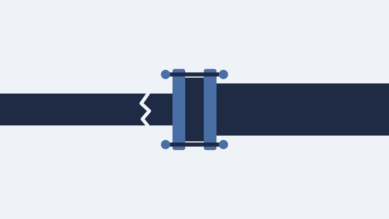 Two pipes of different sizes joined by a bolted flange; a crack in the upstream pipe stops at the joint